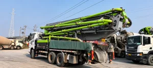 Boom system view of the 2022 Zoomlion ZLJ53510THBJF unidad 10 used concrete boom pump truck.